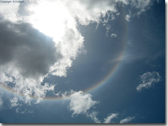 Halo, de kleine kring van 22 graden om de zon, gefotografeerd te Kralendijk op Bonaire (Nederlandse ANtillen)