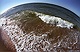 Golven op strand bij Oostkapelle 2, met fish-eye objectief Nikon f16 mm